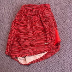 Red Nike Dry-Fit running shorts. Size Large